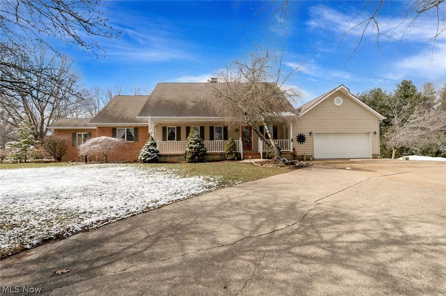 WOW!  This incredibly handsome property will take your breathe away!  Over 3300 sq ft above ground living space, plus an absolutely enormous partially finished basement, on 1.5 acres, serene views & a stone's throw away from Congress Lake!  Custom hardwood flooring begins at the foyer and leads you into this amazing home.  The kitchen showcases solid surface counter tops, warm cherry cabinetry, solid wood plank ceiling, countertop grill & the most spectacular wood burning cook stove!  Additional counter/storage wall & eating area, with pine beam features, opens beautifully to the living room & den.  Living room is walled by windows, multiple sliders to the deck, tray ceiling & a gas fireplace finishes it off.  The den fills with light, reaches to the second floor with an overlooking loft & features a wood burner that can heat the entire house!  Dining area connects to the den & is perfect for any table size/style.  The regal study is enveloped in poplar & overlooks a private deck & wat