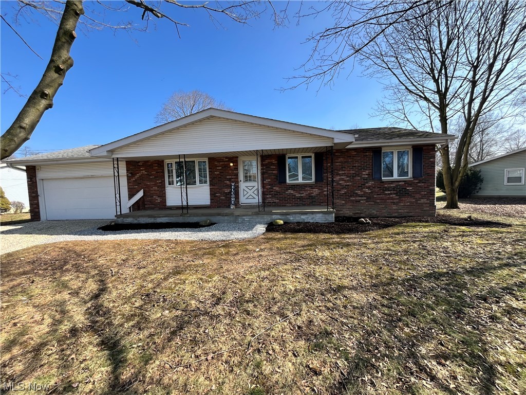 SOLD BEFORE PRINT? Wow! Check out this stunning home located in Mogadore! This beautiful home has been remodeled and awaits a new owner! Walk in through the front door and be greeted by brand new LVP flooring throughout the family room, dining room, kitchen, hallway, and main bath! The fully updated kitchen includes new white shaker cabinets with gold hardware, brand new Samsung appliances, and white quartz countertops! Make your way down the hall to find a fully updated main level bathroom with Lifeproof LVP flooring, new vanity and sink, mirror, toilet, and bath/shower! Continue down the hall to find 3 well sized bedrooms with large closets and barn door access. The bedrooms all have new carpet/padding and have been freshly painted as well! The master bedroom has it's own half bath that includes a new vanity, LVP flooring and toilet! Make your way out back to find an updated deck and fenced in yard! A large unfinished basement has been freshly primed and painted to create a clean, functional space. 2 car attached garage and freshly updated front porch are also worth mentioning! AGENT OWNED!