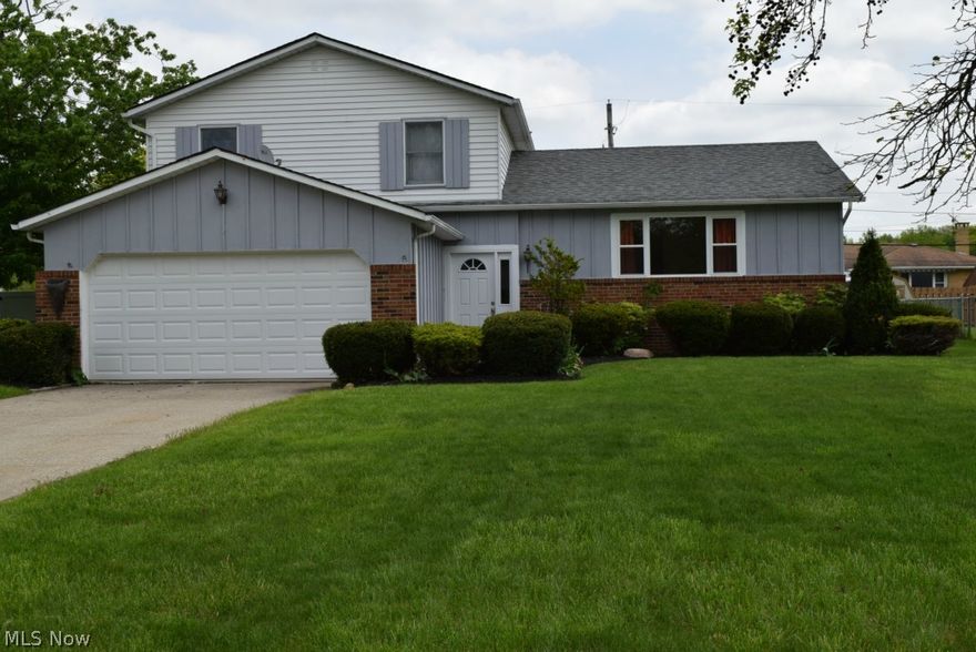 Attractive And Spacious Split Level .....Open Airy Floor Plan With A Basement ....  4 Bedrooms, 2 Full Baths .... Large Updated Eat-In Kitchen With Granite Counter Tops .... Family Room With Cozy Fireplace With Additional Bar Area .... Inviting Enclosed Sun Room .... Large, Fenced Yard With Patio And Storage Shed .... Central Air .... High Efficiency Gas Furnace .... 2 Car Attached Garage ....