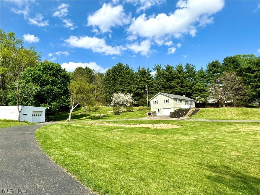 Welcome to your fully remodeled countryside retreat at 45660 CR 58, (Loader Road) Coshocton, Ohio. Situated on a sprawling 2.64 acres of land, this charming property offers the quiet country life with the convenience of being just 3 miles from town.
Inside, discover a beautifully renovated interior with fresh updates throughout.  All new kitchen, complete with brand-new appliances, quartz countertops, and custom cabinetry.  Also, two new bathrooms, new furnace and AC, B-Dry waterproofing in the basement, new deck, new flooring and lighting, and fresh paint inside and out. The property also features a brand-new septic system, ensuring efficiency and peace of mind for years to come. Additionally, a 22x28 detached garage/workshop with a new roof, and a new garage door opener provides plenty of space for parking vehicles, storing outdoor gear, or pursuing your hobbies. Another notable feature is the convenient, circular "in and out" driveway for easy access. Don't miss your chance to own this impeccable retreat in the heart of Coshocton. Schedule your showing today and experience all this property has to offer! Agent owned.