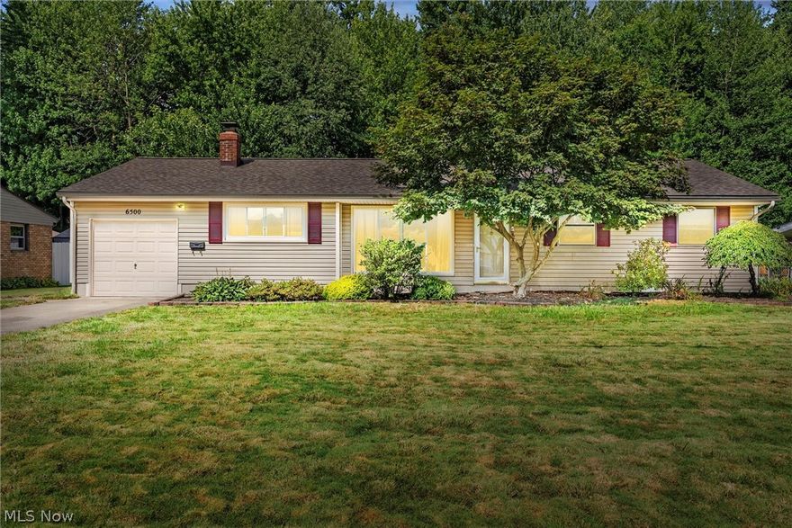 Welcome to this very well-maintained ranch in gorgeous Mentor! Upon entering you will immediately notice a soft palette of paint colors and engineered laminate flooring throughout. The oversized sized living area has built-in book shelving and white brick fireplace. A perfect spot to unwind at the end of the day.  The dining area with track lighting flows directly to the kitchen area. With wrap around quartz countertops, white soft close cabinetry, subway tiled backsplash and farmhouse sink. Great for creating fun and exciting recipes.
Three generous sized living rooms and updated full bath complete the main living area. The backyard completely fenced with patio can be great for entertaining guests. More great features include home warranty, attached garage with nature stone flooring, all appliances included, roof 8 yrs young, new hot water tank, kitchen recently updated, new laminate flooring. You need to see for yourself!