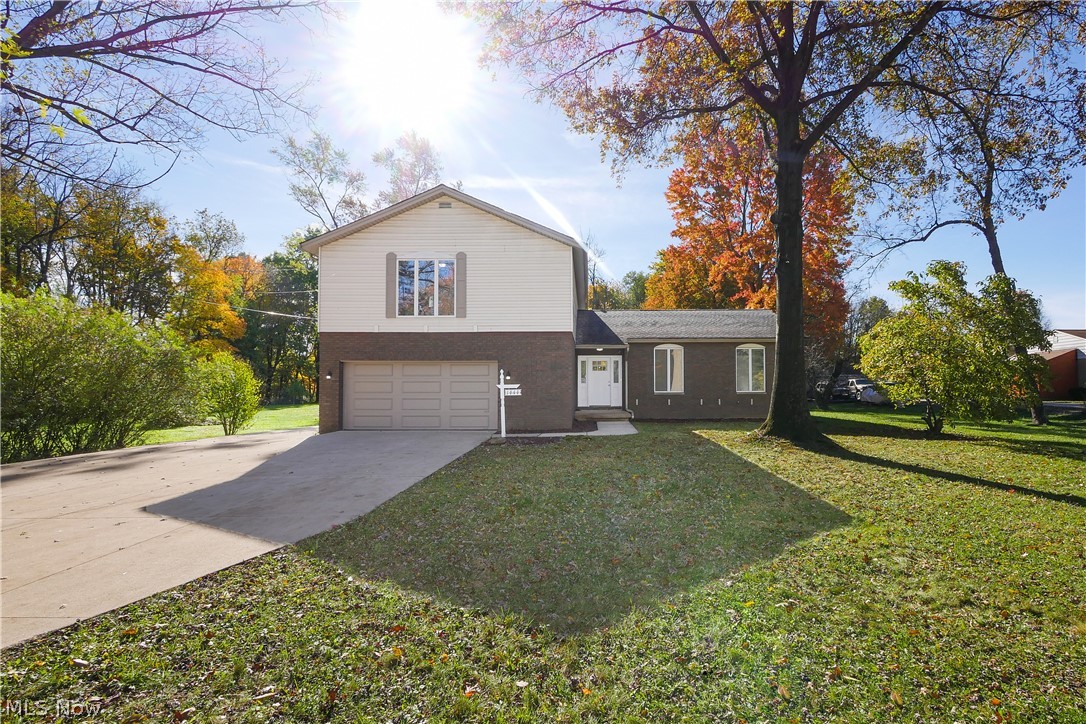 Welcome home to 1444 Chapman Dr! This home features 4 bedrooms, 2-1/2 bathrooms, 2 large common spaces for entertaining, an oversized first floor laundry, an en suite master bath, a formal dining room, and an oversized 2 car garage. With over 2500 sq ft, this spacious home is packed with updates including new paint and flooring throughout, new stainless steel appliances, and even a new kitchen disposal. A new furnace, new AC, new water heater, and new double hung windows will keep you comfortable and provide peace of mind for years to come. New, New, New!!! Sitting on approximately an acre of land, this property allows you to enjoy nature in your huge private backyard. Conveniently located with easy access to shopping and restaurants, Route 8, I-76, Tallmadge circle, and Goodyear Heights Metropark, this home truly is a rare find. Schedule your showing today before it’s gone!