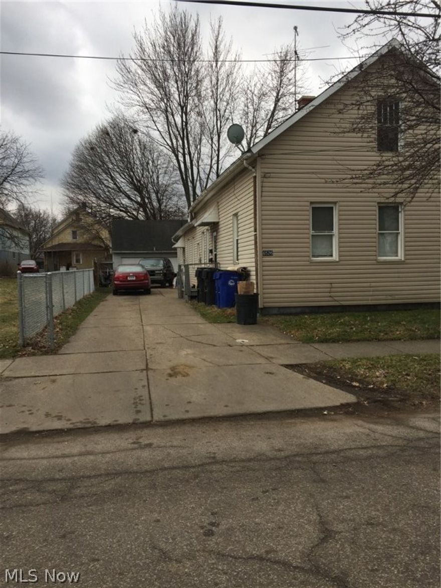 Super front & back Ranch Duplex. Detached two car garage with New Steel door. Privacy wood picket fencing back yard and chain linked side yard. A;; concrete driveway with extra parking pad in back yard. Motion detector lighting Side and back areas. Updated (2015) kitchen flooring back unit. New (2016) carpet back  unit. Front bath being remodeled (ceramic tile flooring,tub surround,new vanity). All seperate utilities (100amp circuit breakers). Many newer windows installed. Chimneys interior tuck pointed. Some appliances. Super strong capitalization rate. Payoff in Five years!!