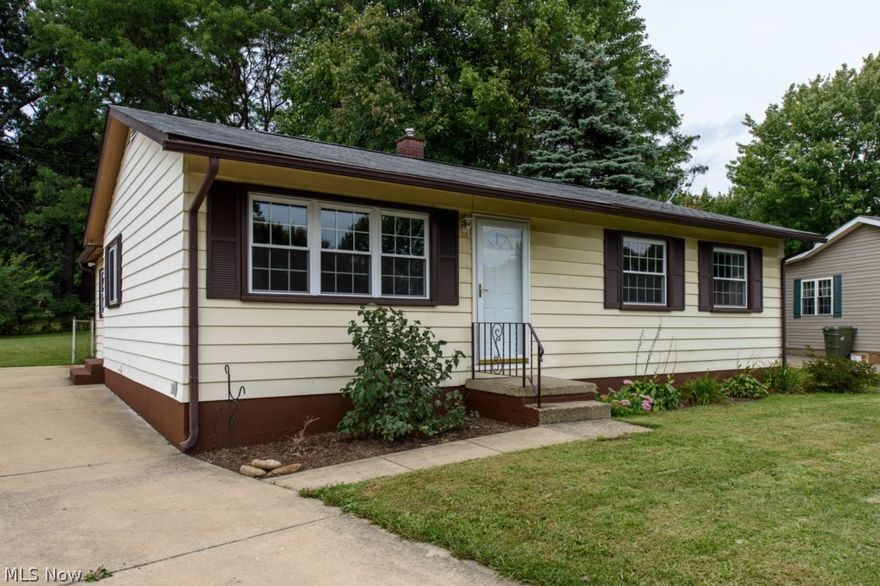 What an adorable ranch home in Perry Township! The home is completely move in ready and has been so well cared for over the years. Not only is there a front living room but there's an addition on the back that adds a family room with wood burner and a second full bath. Off the family room you can either exit to the driveway or the other side takes you to a patio and the gorgeous, treed backyard. The eat-in kitchen has plenty of cabinet space, wood laminate flooring, and all the appliances will stay. The home offers three bedrooms plus a nicely remodeled bath that's bright and clean. The full basement has been waterproofed and is ready to finish if you need more living space. So many updates including most windows 2000, furnace & A/C 2001, carpet 2012, water heater 2013, glass block windows 2104, main bath updated 2014, electric 2014, back door replaced 2014.