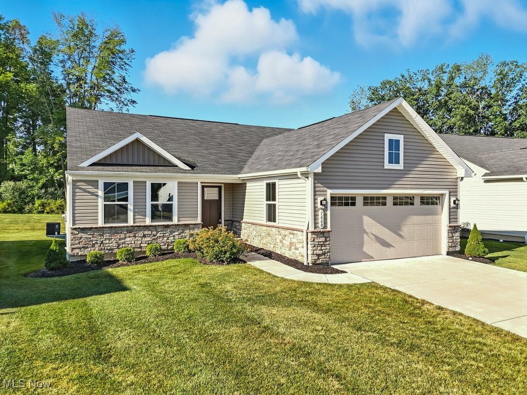 Welcome to this beautifully maintained, 4-years-young ranch home in the desirable Meadow View community of Streetsboro. Conveniently located just off State Route 43 with quick access to the Ohio Turnpike, Route 303, and Kent State University, this low-maintenance single-family home offers a blend of comfort, style, and practicality.
Inside, are 2 spacious bedrooms, including a serene owner’s suite featuring a generous walk-in closet and an ensuite bath complete with an upgraded walk-in shower with built-in bench and ceramic tile surround. A versatile bonus den or office offers the potential for a third bedroom with the addition of a door—ideal for guests or a growing family.
The heart of the home is an open-concept living area filled with natural light, perfect for both everyday living and entertaining. The kitchen delights with white cabinetry, granite countertops, stainless steel appliances, and durable luxury vinyl flooring. A convenient first-floor laundry room with wash basin adds to the home’s thoughtful layout.
The home features abundant storage space throughout, including generous closets, ample kitchen cabinetry, and a full basement with room for shelving or seasonal items.
Downstairs, the large clean and dry basement is a blank canvas ready to be finished—imagine the possibilities for a recreation room, home gym, or media space. Outside, enjoy a private backyard space that backs up to a wooded area, offering both privacy and a front-row seat to local wildlife.
A spacious two-car attached garage completes this lovely home. Whether looking to downsize or enjoy the ease of maintenance-free single-floor living with an HOA that covers snow and trash removal and landscaping, this property is sure to please.
Don’t miss your chance to own in Meadow View—schedule your private tour today!