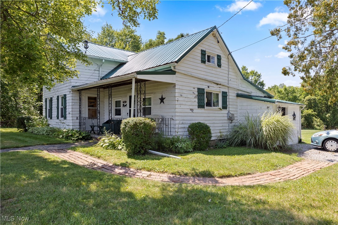 A real doll house. Old-world charm is there to care for you. House built in 1890 and it weilds its charm. Attractive because of the large lot. House has replacement window and newer hot water tank. Large lot has a pond toward the rear. Lot is currently overgrown. Put your personal touch to the house and create the perfect rustic haven for your peronal cozy living quarters.