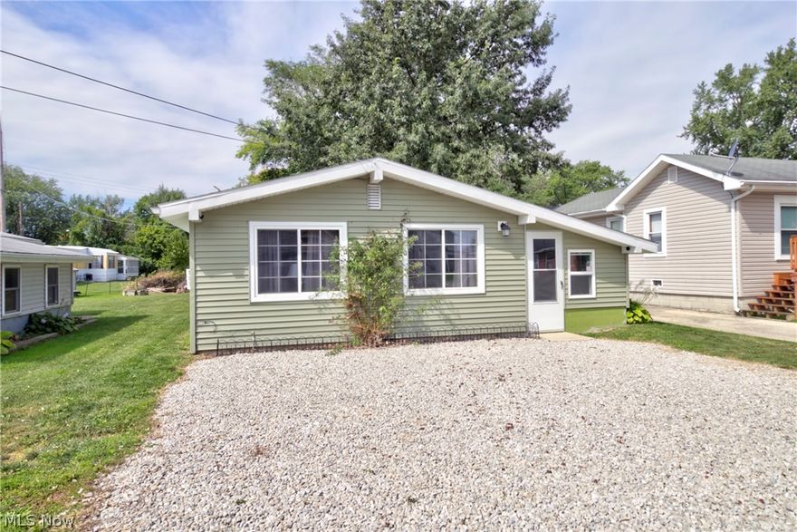 You must see this cute and cozy summer cottage near the lake! Affordably priced and a great first summer home. You also have the option to offset the cost of ownership with Airbnb rentals. Current owner has solid rental history that could be continued. $400 wi-fi lockset and wi-fi thermostat. Newer vinyl siding, roof, carpet, paint and vinyl flooring. This home is turn-key and ready to enjoy! Convenient location close to downtown but just far enough away from all the traffic. Just a short drive to island ferries, downtown dining and entertainment. Back yard for entertaining. Spacious storage shed. Be sure to check this one out today before it's gone!