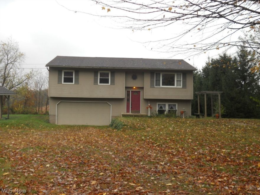 Just move in and enjoy! This lovely home has had many updates throughout. Spacious kitchen with plenty of cabinets and work space. Living room is open to dining room making it a great place to entertain. Lower level has a large family room and half a bath. Large deck over looks the backyard and adjacent cornfield. Additional 2 car garage with workshop. Also has a garden shed, small fish pond and landscaping great location!