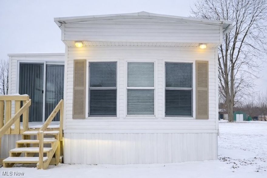 Move-in ready 2-bedroom, 2-bath manufactured home located in Marshall Estates community. This home has been extensively updated including roof, windows, flooring, furnace, and hot water tank. Open living area with additional side room ideal for a home office or extra storage. Updated kitchen comes equipped with refrigerator, stove, dishwasher, and microwave. Central air to be installed. Convenient Marshallville location—schedule your showing today!