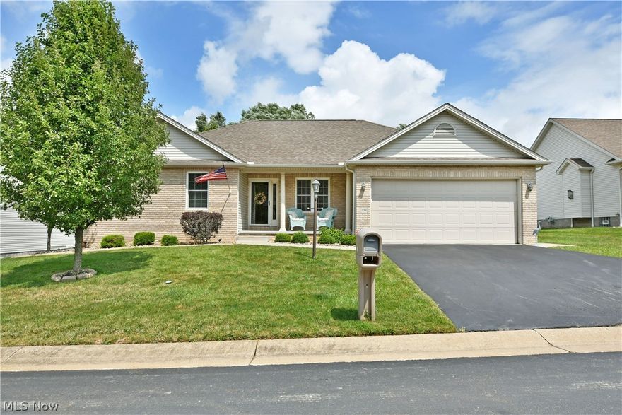 Who knew paradise was located in Cortland, Ohio? One look at the sunroom and a quick stroll out to the covered rear patio and awaiting firepit, and you’ll know you found it here! Welcome home to this delightfully daring three potential bedroom residence, offering tall ceiling and an open floor plan ensuring your instant attraction. A handsome exterior is trimmed in warm brickwork as manicured landscaping leads you inside. Through the front door, a great room layout showcases hardwood styled flooring that stretches out to find a crackling fireplace at the far wall. Turn the corner to enjoy a lovely dining space overlooking both the kitchen and window lined sunroom. The kitchen itself showcases high polished stone countertops with additional seating space that joins stainless appliances and a large hidden pantry. First floor laundry is found next to garage and basement access. A third guest room marks the main hallway, currently configured as home office space. Further down, a stylish full bath divides the pair of remaining bedrooms. Take in the lavish master suite with its walk-in closet and must-see full bath with decadent glass door shower and dual vanity. Call today!