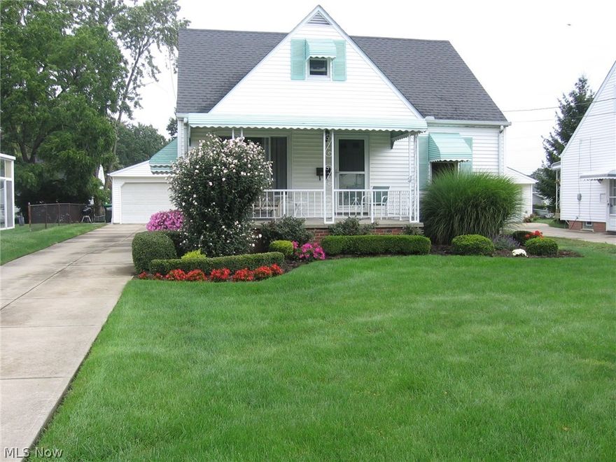 Immaculate 3 bedroom, 2 full bath, vinyl sided Wickliffe bungalow is a buyer's delight. The family cook will enjoy the nicely appointed kitchen with custom cherry cabinets with built in wine rack, updated stainless appliances, granite counter tops and porcelain tile flooring. There are hardwood floors, ceiling fans, ample storage throughout the home with wonderful natural light!
There is a first floor master bedroom, a second first floor bedroom, and a second floor large dormer bedroom with built in shelves, drawers, large walk in closet with additional storage space. The basement is finished, and has glass block windows, a separate large laundry room with utility basin. 
The glass enclosed sunroom offers a gas stove to keep you toasty warm on chilly days. The brick paved outdoor patio is beautifully landscaped and fenced in for privacy. The back yard has landscape lighting, outdoor electrical access and a manicured lovely yard. 
There is a spacious 2 1/2 car garage. Home is close t