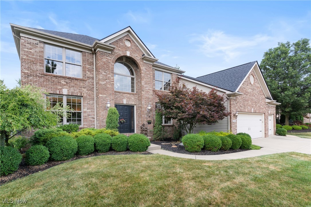 Welcome to this gorgeous, tastefully updated home in Waterford Crossing! Step inside and feel welcomed by the rich hardwood floors that flow throughout the first level. The open concept kitchen is equipped with newer appliances, granite countertops, and ample cabinet/counter space along with a spacious island that effortlessly opens up to the two story living room with a stone fireplace and mantle. The first floor is completed by an office/bedroom, full bathroom, and laundry room. Upstairs find four additional spacious bedrooms, including an owner's suite with massive ensuite bathroom, and an additional full bathroom. The finished basement provides additional recreation space and comes equipped with a wet bar and workout area. New roof 2024. Whole house interior was just repainted.