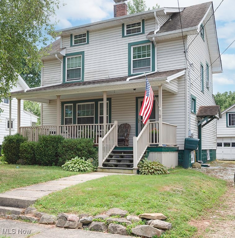 Lovely 2 story home with welcoming front porch and lots of character. Truly a move-in ready gem nestled in the heart of Newton Falls, Ohio. This 3-bedroom, 1-bath residence blends classic charm with modern convenience across 1,252 sq ft of living space. Gleaming hardwood floors throughout the first level. You will enjoy the beautiful stone fireplace in living room. Spacious kitchen with abundant cabinetry. All appliances will stay including washer and dryer. Elegant built-ins in the formal dining room for added character! Large basement with laundry and storage. Potential bonus room with walkup attic. Detached 2-car garage with storage on 2nd floor. Also, a 1-year Home Warranty added for extra peace of mind!
