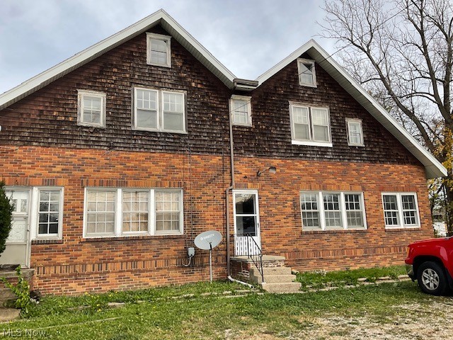 INVESTORS DREAM! 1659 Krumroy is a well built, all brick, sturdy multi-family home. Four units in total make up this investment property. Three of the units are one bedroom and the upstairs unit is a two bedroom. This home has amazing potential both esthetically and financially. Reconfigure, create spaces, use your imagination the possibilities are endless. An additional parcel being sold with this home which total nearly 1/2 acre.