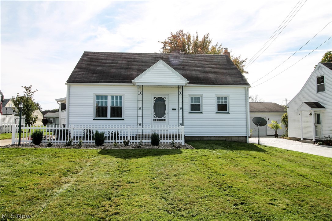 Welcome home to this lovely three bedroom and two full bath cape cod, all you have to do is just move in! The bright eat in kitchen has been updated with new counter tops and back-splash, new stainless stove 2018 and newer tile floor. There are refinished wood floors throughout the home, new window treatments 2018 and updated electric service, lights and fixtures. The hallway bathroom has newer tile floor 2008 and toilet, then you have two bedrooms that complete the main floor. Upstairs there is room for a fabulous master bedroom. The full finished basement has newer glass block windows, updated full bathroom and laundry area. Also there is extra room for an extra bedroom, storage area and or office etc. The garage has new dry-walled with electric 2018. Freshly landscaped yard 2018, nice size backyard. Newer concrete porch and walkway and newer awning on side of porch. The windows, doors, and newer siding all in 2008. Hot water tank new 2018, Furnace and AC 2008. Foundation and chimn