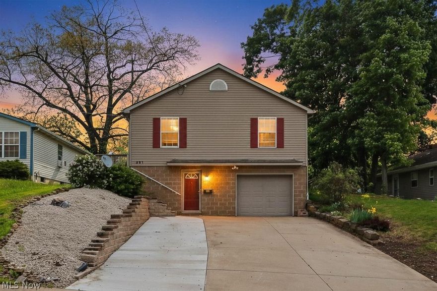 Welcome home to this beautifully maintained raised ranch in the heart of Ellet! Built in 2007, this 3-bedroom, 2.5 bathroom home offers a functional layout with modern updates throughout. The entryway features an open staircase leading you to the main level featuring large windows, open living room dining area, and full kitchen with SS appliances perfect for entertaining and everyday living. The hallway offers convenient laundry access and a full guest bath. The nicely sized primary suite includes a private en-suite bath, while two additional guest bedrooms provide flexibility for guests, or home office space. The third bedroom offers direct access to the backyard. 
The finished lower level adds even more living space with half bath and access to the extra deep 1-car garage. Major updates completed in 2025 include new furnace, A/C, hot water tank, retaining wall and driveway concrete, giving peace of mind to the next owner. Conveniently located near shopping, dining, parks, and highway access, this move-in ready home is one you won't want to miss!