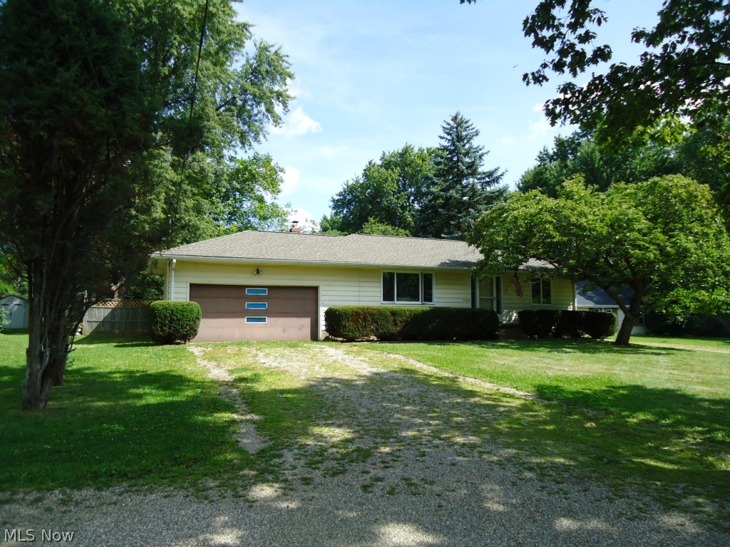 Easy Living Ranch in convenient location! Hardwood floors, open floor plan & 2 full baths (one remodeled in 2013). Family room with fireplace and pool table! 2 car attached garage and large storage shed. Large (82' x 324') fenced yard with patio--perfect for kids and pets! Close to school!