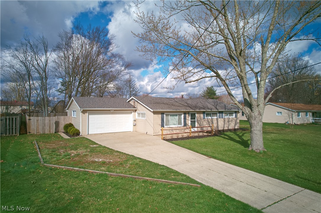 Recently remodeled ranch home featuring cherry-wood kitchen cabinets with granite counter tops, with all stainless steel appliances. There is fresh paint and new flooring throughout. Large laundry plumbed to add a second bath. Walk out onto a patio for privacy and enjoyment. Outside you will find a huge backyard completely fenced in with a wood privacy fence and two large gates. This home is complete with a two car attached garage and a paved driveway. Move in ready!