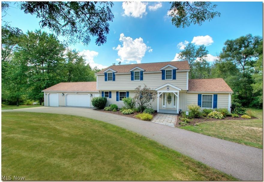 One of nine homes on peaceful, private country lane in Munson! ($50 a month private road fee) Wonderful 4 bedroom, 2.5 bath Colonial situated on 2.56 picture-perfect acres. Hardwood floors adorn this entire home! Spacious sunken Living Room with vaulted ceilings and Large Family Room with beautiful fireplace are perfect for entertaining.  Newly painted kitchen with Corian countertops and plenty of cabinetry - all appliances included. FIRST FLOOR Laundry Room (washer and dryer stay!) and Renovated first floor half Bath. Second floor features 4 Bedrooms and 2 fully remodeled Baths. Master bedroom has a walk in closet and glamour bath with Granite Double Vanity top, Moen/Bradford faucets, shower stall and a soaking depth cast iron tub. Fully remodeled hall bath with granite double vanity is located on 2nd floor. The back of the home features a spectacular 480 SF back porch which has overhead lighting, Portico Cedar Composite Decking, Timber Tech Vinyl railing and Azek Breadboard ceiling.