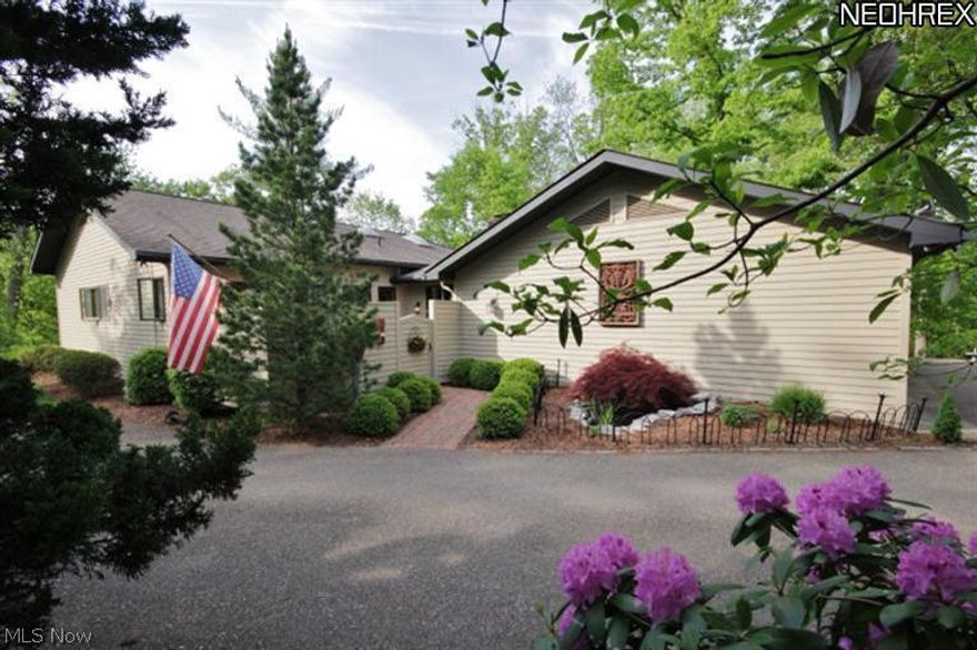 Location, location, location, across the street from Zanesville Country Club and on a quiet cul de sac. This contemporary style home features an open floor plan, lots of windows, wood floors and decks and patios that take advantage of its natural setting in the woods! Great layout for entertaining and 2 fireplaces add a warm and comfy atmosphere.