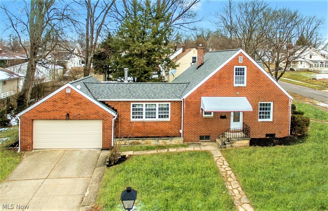 *MODERN Remodeled All Brick Firestone Park Beauty! *3 Bdrms, 1.5 Baths, Sunroom/Family Rm Addition, 2 Car Attached Garage And Double Gated FULLY FENCED IN YARD W/Deck & Covered Patio! *Great Curb Appeal ~ Corner Lot *Newer ROOF & Vinyl WINDOWS *Low Maintenance ~ NEW FURNACE, Hot Water Tank, LUXURY Plank Water Resistant Flooring Throughout 1st Floor! *Reclaimed Shaw Carpet In Upstairs Bdrm *Two Upgraded Gridded Windows In Each The Living Rm And Both First Floor Bedrooms! *Kitchen Completely Updated With NEW White Arcadia Shaker Style CABINETS And Pantry W/Hardware, Commercial Style Faucet W/Sprayer, Overmount Stainless Sink W/Tray, BUTCHER BLOCK Countertop, Above Stove Tile Accent Wall, White SUBWAY TILE Backsplash, Stainless Steel GAS 5 Burner Stove W/Middle Griddle, Stainless Steel Dishwasher, Dual Triple Jar Flushmounts & Pendant Glass Jar Fixture ~ WOW! *Step Down Into A Great Dining Rm/Family Rm With SHIPLAPPED Walls, 2 Gray Accent Brick Walls, Recessed Lighting, 6 Windows AND A Wo