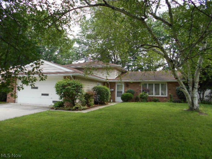 REDUCED..... Large split level home with attached 2 car garage. Living room, family room, formal dining room, eat in kitchen. New forced air gas furnace and new A/C. Back yard has patio and storage shed. 1 year home warranty included. Great value... Call now!