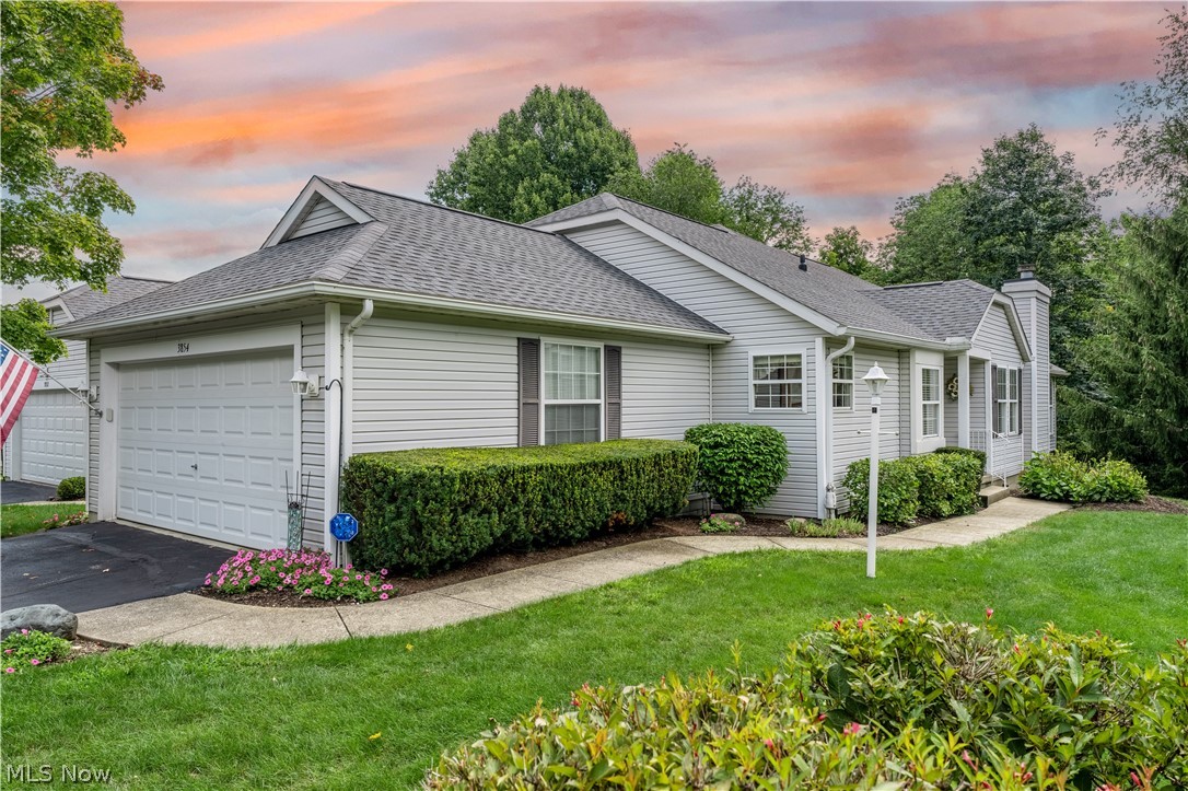 This gorgeous ranch condo located in the heart of Stow, features 3 bedrooms and 3 full baths, a large four-season sunroom, and a finished basement that walks out to a patio and the beautiful back yard! The inviting foyer opens up into the spacious great room with vaulted ceilings that includes a formal dining area and a gas fireplace. A slider flanked by spacious windows off the great room leads to a beautiful sunroom with vaulted ceilings, ceiling fan, and windows galore that look out onto a private backyard. The eat-in kitchen has generous cabinetry, quartz countertops, a pantry, SS appliances, and an eating area with a large window seat. The large master bedroom features vaulted ceilings, a ceiling fan, and a very well-appointed master bath with his and hers walk-in closets and a step-in shower. The 2nd bedroom on the main level boasts a large closet and is just steps to the main bath, making it the perfect guest bedroom. The convenient first floor laundry, w/wash tub, includes cabi