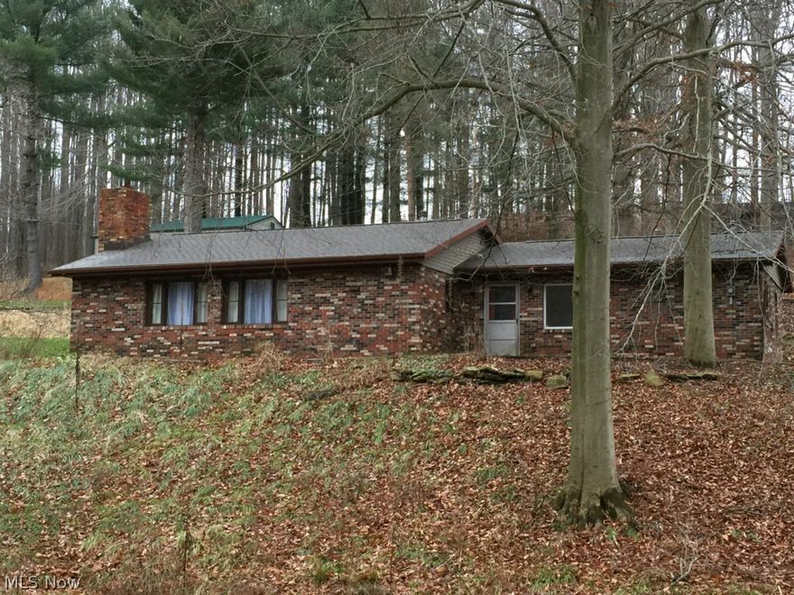 Three Bedroom Two Bathroom Home near Leesville Lake in a secluded wooded area of Carroll County.  This is a Furnished home that is ready for new owners.  Nearby Fishing in the summer and hunting in the winter.......the best of both worlds is waiting for you!  Call soon to view this Brick Ranch home.