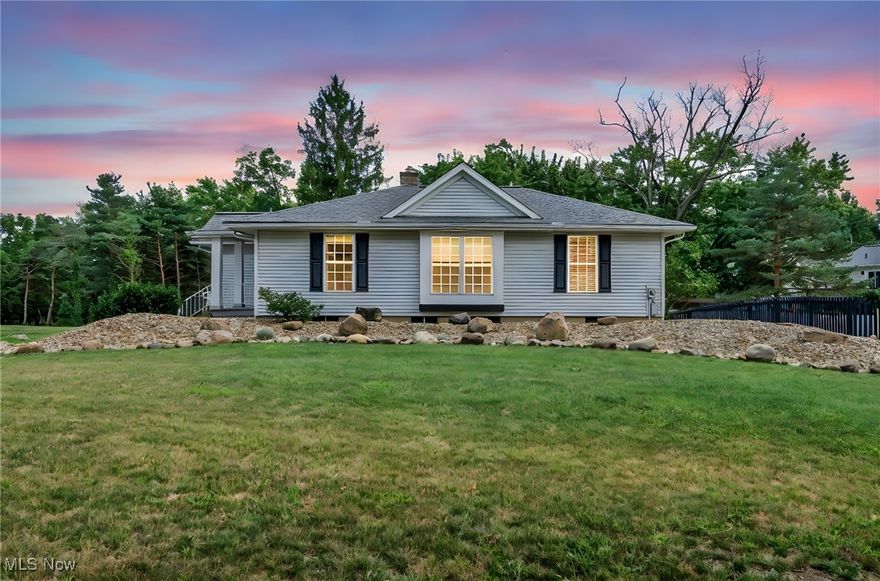 Rare opportunity to own a 1.7 acre lot just around the corner from the highly desired Medina Square! This two bed and two and a half bathroom ranch home has an open layout, beautiful hardwood floors throughout and is seton the street's LARGEST lot of land. The kitchen features a newer skylight window, Corian countertops, stainless steel appliances, and a Wolf gas cooktop with a hood. The great room features a wood burning fireplace and plenty of natural lighting. Don't forget about the extensive wrap around wooden deck, perfect for morning coffee or enjoying a summer night with friends and family. Another plus is the full walk-out basement with the potential to make another living space and bedroom. Roof 2020, Furnace, A/C 2011, H2O tank 2021. New window blinds, nest thermometer, French drain, and updated first floor plumbing. Schedule your showing today!