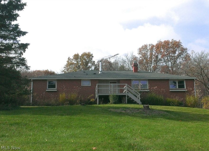 Privacy! Beautiful views & wildlife are boasted here. Large 24x33 outbuilding. Open ranch with large rooms. Dual heat source, propane and wood. Workshop area in garage. All appliances stay. Don't miss this one, priced to sell.