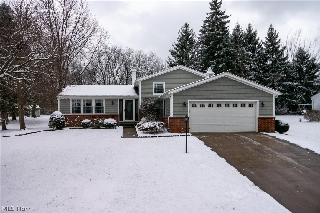 Buy your next home in time for the holidays! This is the home you have been waiting for! Four level split is meticulously maintained and shows pride of ownership. Spacious living and dining rooms lead you through sliders to the stylish screened in porch, which is vaulted and has 2 skylights! You will spend a lot of time in this room for 3 seasons and enjoy the wildlife and private backyard. Beautiful eat in kitchen with hardwood floors features an awesome pantry with solid wood doors and nice updates to include granite countertops and no touch faucet (2017), stone backsplash (2018) and all appliances (2015). The second level features 3 good sized bedrooms and a full updated bath complete with a 6' Kohler Air Bubble Tub and double vanity. The lower level features a spacious recreation room with gas fireplace, which was added in 2014, another room - perfect for whatever your heart desires and a full bath with walk-in shower. Just a few more steps and you will find a spacious of