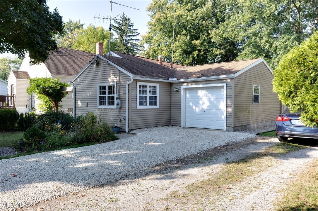 This ranch style home is designed with a lot of love and detail. As you walk into the front door you are greeted by a spacious living room with high end vinyl plank flooring. The custom designed kitchen has gorgeous black counter tops, a large double size black sink, and custom designed tile, as well as a high end stackable washer and dryer, gas stove, counter depth refrigerator and dishwasher. All bedrooms are freshly painted and two of the bedrooms have new carpet. To cap the home off, there is a newly renovated bathroom and an office newly painted and carpeted. The master bedroom has laminate floor and matching windows and woodwork. The exterior has a fresh graveled drive way, wooden fence for privacy and scenic garden view. The home is closely located near Betty Jane CLC, restaurants, state route 76 and other shops.
