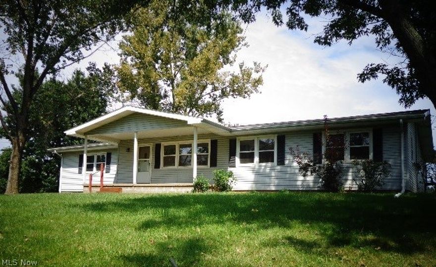 Very nice Ranch home with 3-4 bedrooms/2 baths. Lower level family room with wood burning fireplace. Original hardwood floors have been restored beautifully. Large kitchen and dining area. All rooms are freshly painted, new flooring in lower level family room and new gutters installed on rear of home. Attached 2-car garage. Secluded setting and just minutes to Atwood Lake.