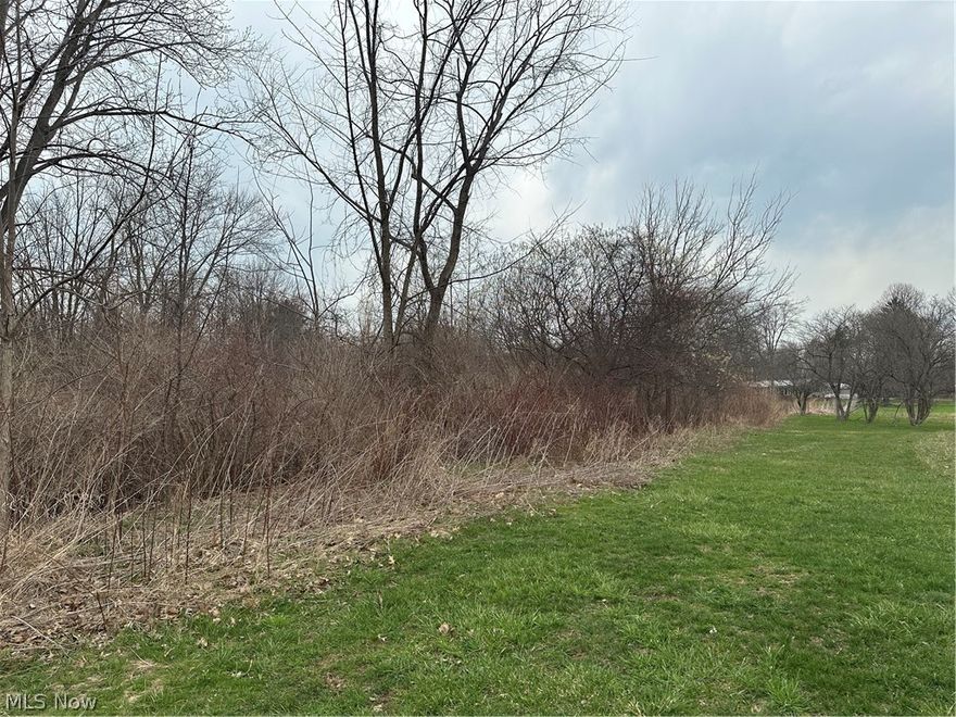 .82 acre lot in a residential neighborhood in Madison ready for you and your builder!   Water and sewer at the street. All information provided believed to be accurate, but not guaranteed.