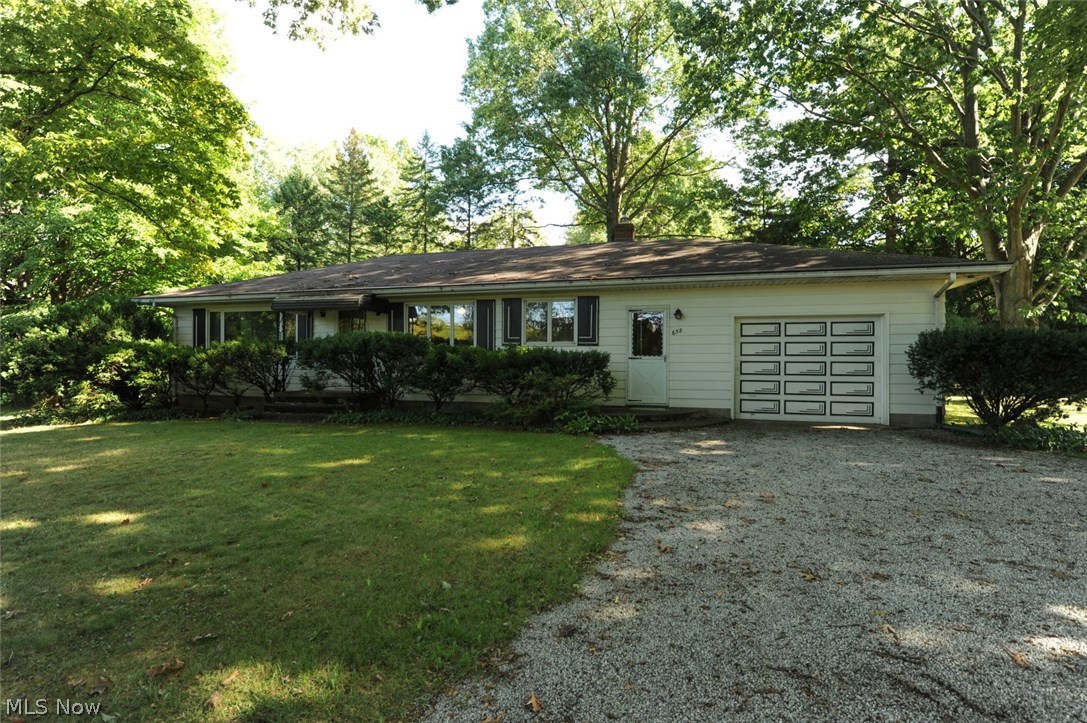 Wooded retreat, right here in Coventry! This beautiful ranch has maintained all it's original charm. Awesome retro kitchen with all of the cabinets and counters in mint condition. Yes, the counter top oven with pull out range works! The large kitchen has counter top seating and opens up to a dining area that will fit a full size dining set. Built in cabinets in dining area are just right for cans and spices, and the kitchen has a large closet that could be used as a pantry or coat closet. Gorgeous original hardwood floors begin in the living room and go through hall and bedrooms. Three very nice sized bedrooms have large closets. The full bath has tons of counter space and updated tub/shower. The full basement with tall ceilings is perfect to be finished! The 2nd bath is located in the basement. All pieces are functional, just needs enclosed. Updated furnace, hot water heater, and electrical. Entire basement waterproofed in 2007, Humidex ventilation system installed 2011. A