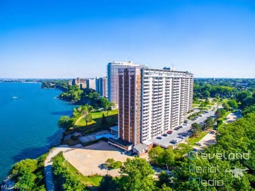 #1717 - Popular step down living room with picturesque sunset views and sweeping Lake Erie water views.  Gorgeous granite kitchen with newer cabinetry and appliances.  Remodeled bathroom.  One garage space and one storage locker included in the price.