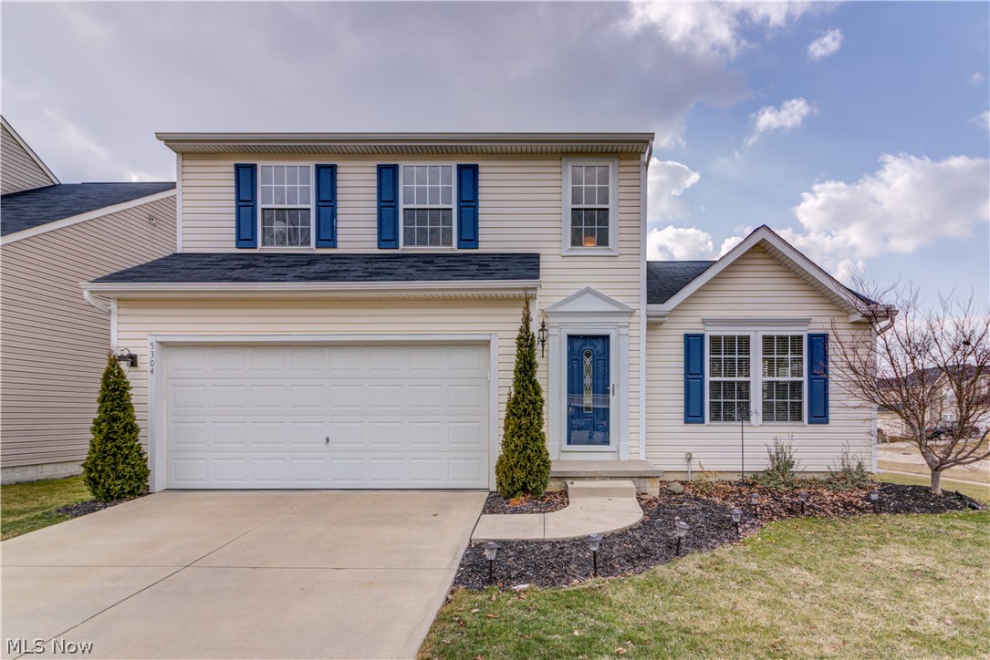 Don’t miss the chance to live in Meadow Lakes in North Ridgeville - named one of the best places to live in the Cleveland area by Cleveland Magazine. This 3 bedroom, 2.5 bathroom home showing tasteful updates with functional indoor and outdoor spaces. The first floor has been transformed with beautiful wood laminate flooring that flows throughout. A mini-makeover to the kitchen brightens the space with freshly painted white cabinets, coordinating hardware, durable countertop overlay, and beadboard trim. A spacious dinette has a ceiling fan and sliding glass doors that lead to a two-tiered deck. Back inside, entertain in the large family room featuring a vaulted ceiling and gas fireplace. Natural light shines in through extra windows. Finishing out the first floor is a convenient laundry room and half bathroom. Upstairs, a large master suite is highlighted with a vaulted ceiling, walk-in closet, and ensuite bathroom inclusive of double bowl sinks and 5 foot shower. Additional bedrooms a