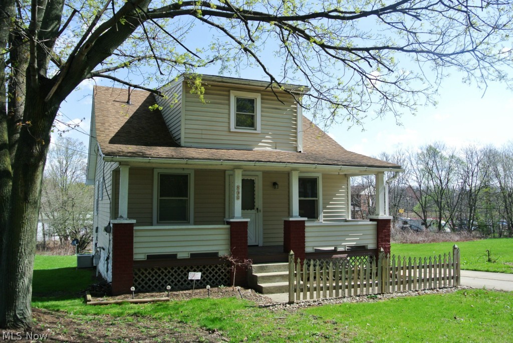 Perfectly move-in ready home with 3 bedrooms and 2 full bathrooms. The large front porch entrance welcomes you in to the great room with separate dining area and wood floors. The kitchen has all appliances, updated flooring and pantry area. 2 bedrooms with new carpet(2014) and brightly renovated bathroom are located on the main floor. The entire upstairs is currently being used as the master bedroom with 2 closets, dressing area and private bathroom. Full basement with walk-out door to driveway. Don't miss this opportunity! Call today.