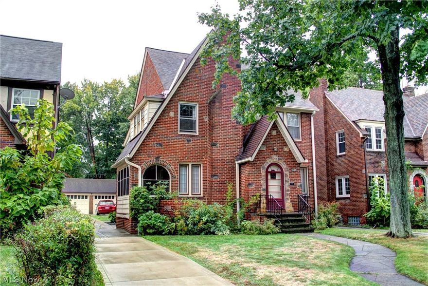 A Beautiful 1773 sq. ft. Brick Colonial in a desirable area of Cleveland Heights, featuring 3 bedrooms, 1.5 baths, 2 car garage, partially finished basement and additional living space on the third floor! Fantastic 3 season sun porch off the living room. Lennox furnace in 2011, roof in 1998, water tank in 2003 and Gutter Guards installed throughout.