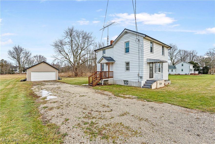 Offered for sale 3 parcels approximately 1.75 +- acres zoned B1 General Business in the city of Green. On one parcel you have a house that you can live in it , rent it or use as an office to conduct your business from. An oversized garage located behind the house. Both home and garage went through some updates. New vinyl siding and metal roof for the garage. New windows, new metal roof, new flooring, updated the full bathroom , new range oven and refrigerator, new patio for the house. Big vacant land behind the house. Amazing location near the freeway and shopping center. Rare opportunity with so much potential and possibilities. Public water and public sewer are on Greensburg Rd for easy hook up. Property sold AS IS.