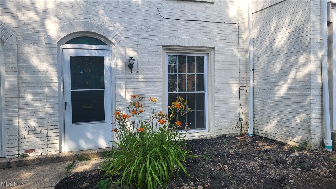Move in Ready. Freshly painted, newer windows, whole condo AC, private fenced in yard. Modern kitchen with newer appliances. 12 month lease. no Section 8.