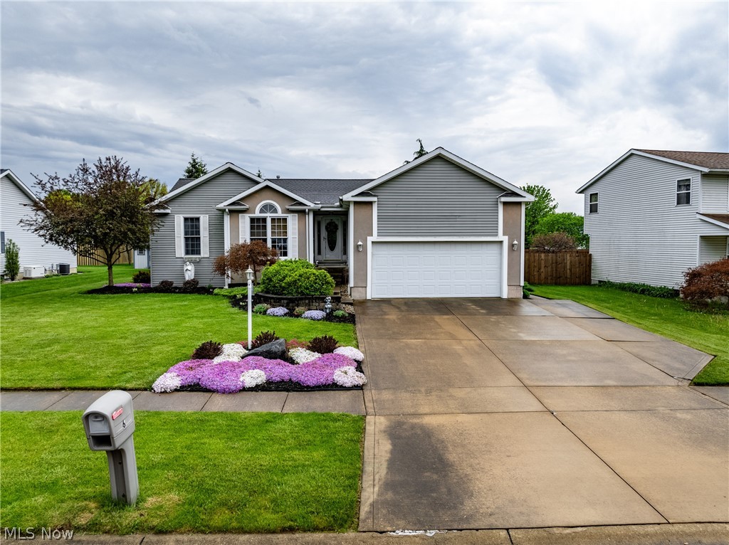 Spacious & inviting 3 bedroom, 3 bath ranch tucked away on a great cul-de-sac street on Norwalk's west side! Perfect location that is walking distance to Arctic Shaved Ice in Suhr Park and AJ's Ice Cream on west main, as well as North Coast Rails to Trails, schools, downtown Norwalk! Home features a sizeable kitchen with extra bar seating, combo dining, and a cozy living room featuring a gas fireplace. The master bedroom boasts an en-suite with a spa tub, walk-in closet, and access to the back deck. Enjoy the beautiful sunroom flooded with natural light and portable electric fireplace. Private backyard with patio, shed and space to entertain. Recent updates include a new roof in 2018, hot water tank in 2019, and HVAC 2000. Main floor laundry. Hardwood floors throughout living spaces. Don't miss this one!