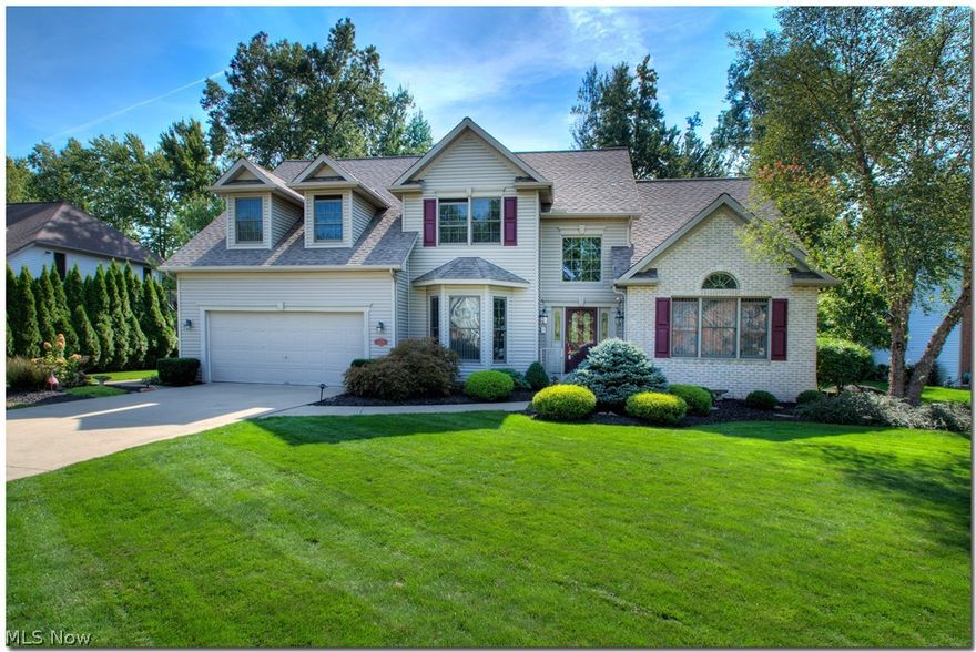 Beautiful custom two story in much sought after Parkland Estates! Quality constructed and wonderfully cared for! Bright & cheery two story foyer. Formal dining room offers crown molding and chair rail. Gorgeous gourmet kitchen boasts plenty of cabinet space, down lighting, center island, granite tops & backsplash plus separate eating area! Inviting family room with vaulted ceilings and gas fireplace! Fantastic first floor master with glamour bath featuring: corner tub, separate shower, twin sinks and walk-in closet! Three bedrooms up with full bath and loft area! Huge basement with full bath and separate kitchen area with cabinets, range, refrigerator, freezer, and plenty of storage! First-floor laundry room! Two car attached garage, sprinkler system, private wooded lot! Neighborhood has a 45-acre park with walking trails, playground, and pavilion!