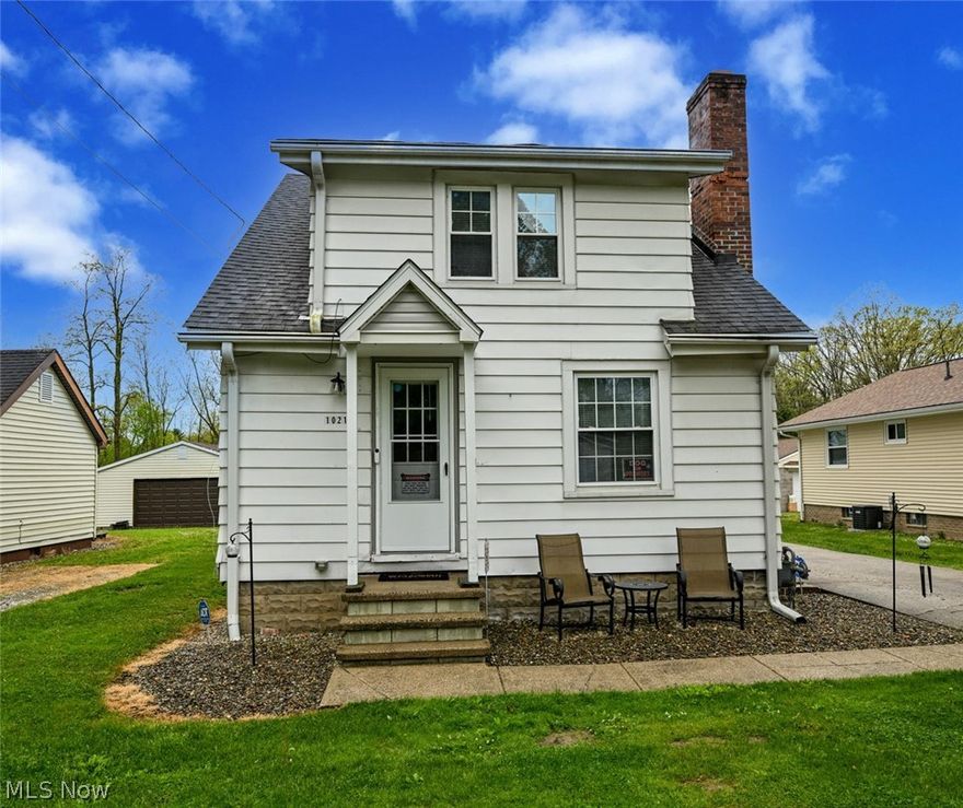 Charming century home in the heart of Aurora offering over 1,700 sq ft of living space. Full of character and potential, this home features spacious living areas, open floor plan (especially for a century home), 2 Car garage, and a full basement. Historic charm is abundant throughout this lovely home. Updated Main bath and carpeting on the second level, Situated on a spacious private lot on desirable East Blvd, conveniently located near schools, shopping, dining, parks, and major highways. Great opportunity at a GREAT price!  Make your appointment today before it's too late!