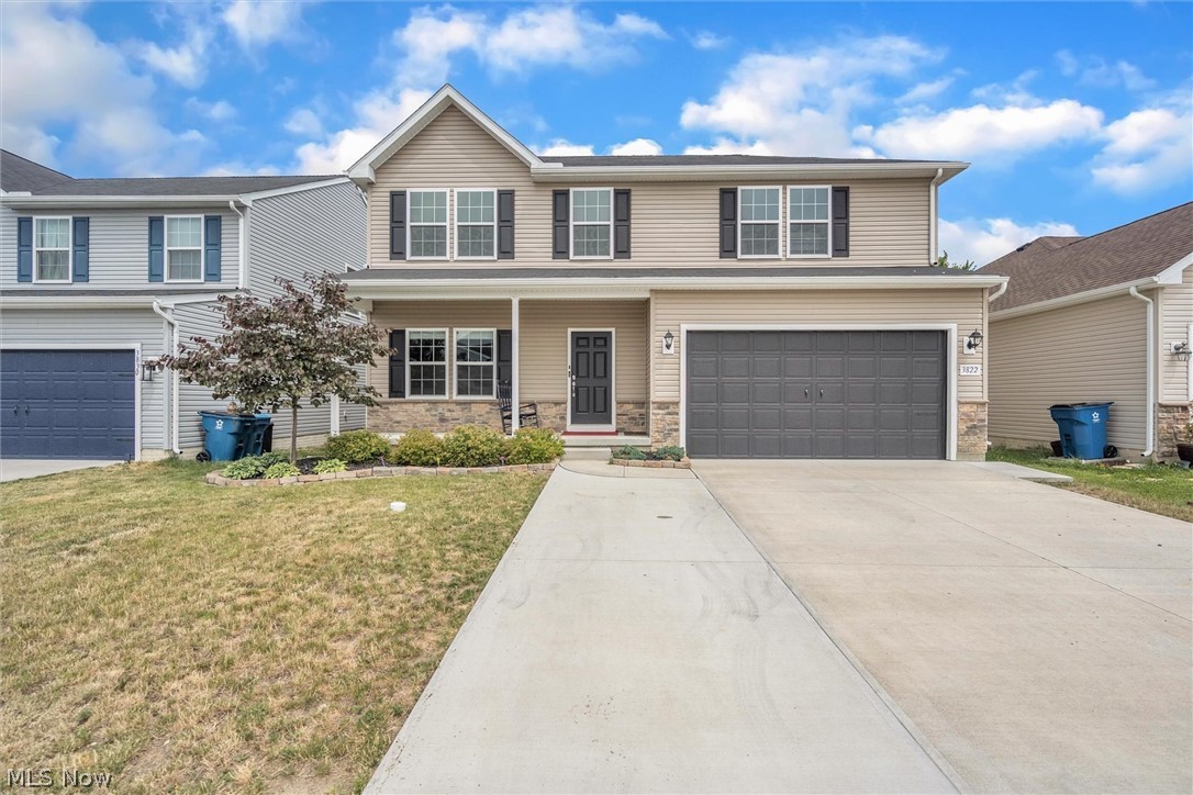 This beautiful newly built colonial welcomes you with a front porch perfect for enjoying your morning cup of coffee. Through the front door you will find a multi purpose room that can be used as an office or playroom. Continue down the hallway to the family room that is bright and airy & contains a cozy brick fireplace. The adjacent eat-in kitchen features grey cabinets, granite countertops, stainless appliances and a large island. The dining room is the perfect place to host a dinner for guests with a beautiful lighting fixture and lots of sunlight from the windows and sliding glass door that leads to the back yard. The first floor is rounded out by a half bath and access to the attached two car garage. Upstairs you'll find the master suite, two large bedrooms, a full bath and laundry room. The master suite is spacious and the ensuite bathroom features a walk in shower, double sinks and large walk in closet. In the lower level you'll find a massive recreation room that makes a great h