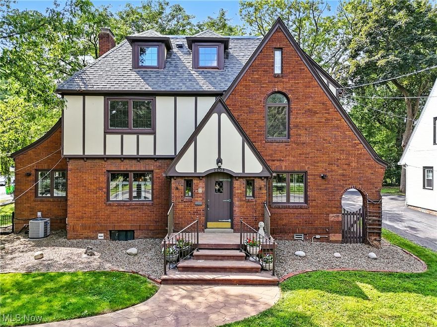 Stately Tudor Charm Meets Modern Comfort,This impressive Tudor home on a corner lot offers unmatched character, with thoughtful updates throughout. Spanning four levels and over 4,000 sq. ft. of living space, it features five bedrooms and five-and-a-half baths, beautiful hardwood floors, built-ins, and French doors. The completely remodeled kitchen is a chef’s dream, boasting abundant cupboard space, a double oven, stainless steel appliances, and an expansive dining area perfect for entertaining. The main living room, centrally located, showcases built-in bookcases, while the adjacent home office/playroom is bathed in natural light from two walls of windows. Upstairs, the recently renovated owner’s suite impresses with a breathtaking spa-like bath featuring heated floors for year-round comfort. Three additional bedrooms, each with its own private full bath, complete the second floor. The third floor offers a spacious, open-concept room with ample storage and its own full bath—ideal for a guest suite, hobby space, or media room. Newer windows throughout the home (with a lifetime warranty) provide peace of mind, while a whole-home generator ensures uninterrupted comfort. Outdoors, enjoy a patio aligned with Wooster paver bricks, screened-in gazebo, and lush landscaping. The detached three-car garage offers additional storage above, perfect for an art studio or hobby room. This home blends timeless elegance with modern convenience—ready to welcome its next chapter. This place is sure to impress and is calling you name, call your realtor today to schedule a showing.