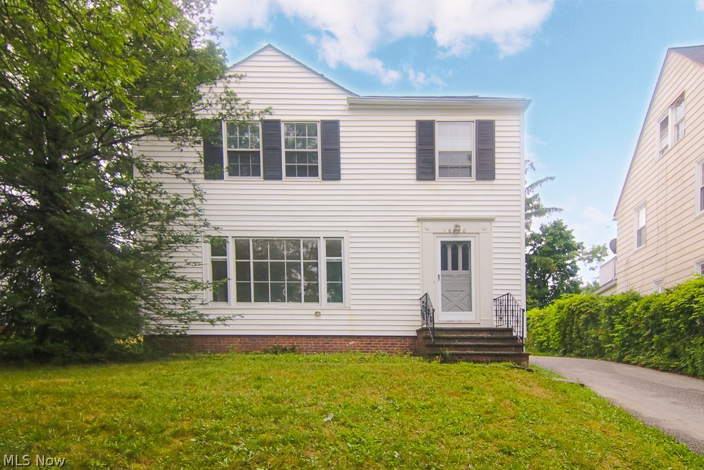 Move right in to this gorgeous colonial that is convenient to everything you need in Shaker Heights! With over 1,500 square feet of living space & the rear balcony overlooks the picture perfect backyard, all this home needs is you! Beautiful laminate flooring throughout the formal living & dining room. The updated eat in kitchen has a brand new dishwasher and newer cabinetry & hardware! There is a breakfast nook/dinette area in the kitchen that overlooks the peaceful backyard - what a place to sit and have your morning coffee! Brand new carpeting in the upstairs bedrooms! The master bedroom has his & her sliding closets! Home has been well cared for & has many updates throughout! Minutes to The Cleveland Clinic, Downtown Cleveland, Case and University Circle. Just move in! Property will be POS compliant/violation free.