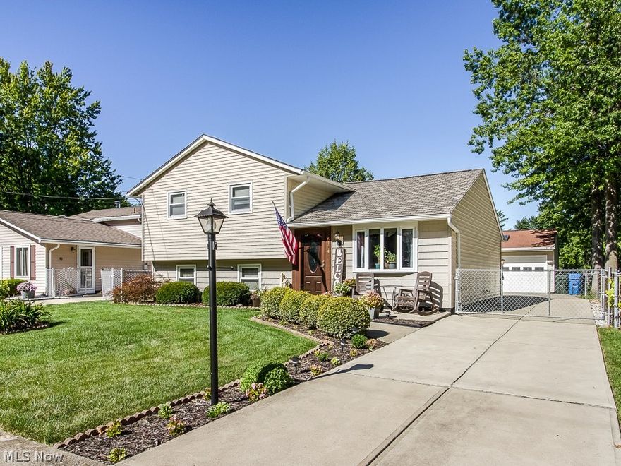 Move right into this nicely updated & well taken care of home 3 bedroom 2 bath split-level home with 22x30 insulated, heated & cooled garage with skylights perfect for hobbyist.  The main level of the home has a kitchen & living room with hardwood flooring currently being used as large dining area. Three bedrooms & full bath upstairs.  The lower level has a spacious family room complete with wood burning fireplace, second full bath, laundry utility area & entrance to fully fenced backyard.  Additional features & updates include: tear off roof with 50-year shingle 2016, updated Anderson exterior doors, vinyl windows, vinyl siding, rain barrel watering system, central air 2009, updated interior doors, retractable awning, storage shed 2014, spacious attic storage in garage, refrigerator 2018, washer & dryer 2018.  All Appliances & 12-Month Home Warranty Included!