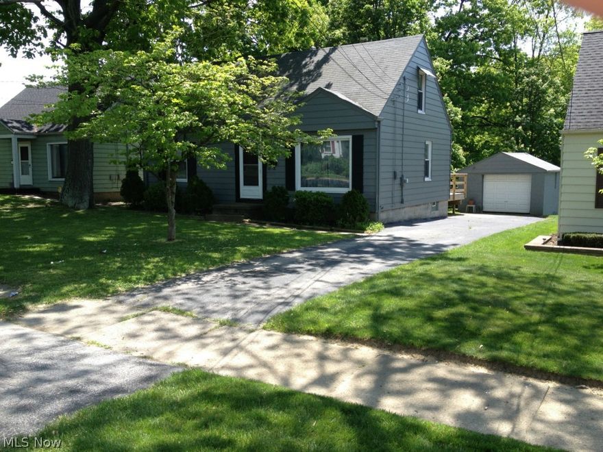 This home is such a GEM!  Totally renovated and truly "turn key", this little darling has tons of charm and no work needed other than moving your furniture in.  This three bedroom property has, a brand new furnace and air, remodeled kitchen with new solid marble countertops, high end chrome fixtures, porcelain tile floors, and classic white subway tile backsplash.  The oak floors have been refinished and there's brand new carpet in the expansive master bedroom.  The mstr bed feels like it's straight out of Hollywood with a solid wood tray ceiling and custom trim work that's been painted a brilliant high gloss white.  In juxtaposition to this is a feature wall constructed out of 100 year old reclaimed barn wood.  Also custom built are the "his" and "hers" closet and dresser spaces.
The basement has been freshly painted and is big, bright, and clean.  Outside is a HUGE two tiered deck that looks like it would be great for entertaining.  A new fence was just installed for your animals an