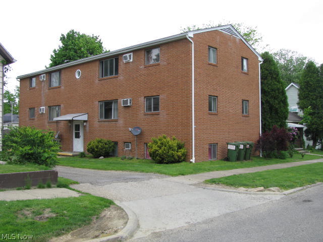 All brick 6 unit apartment building in a good North End location w/ 7 off-street parking places! Owner pays water, sewer, & trash. Renters pay their own electric. Coin operated washer and dryer stay w/ building. Wood floors in beds and living rooms, kitchens & baths have new vinyl flooring, new a/c units except 1, new roof, 2 refrigerators & all ranges stay w/ building. Four 2 bedroom units & Two 1 bedroom units all under current leases.